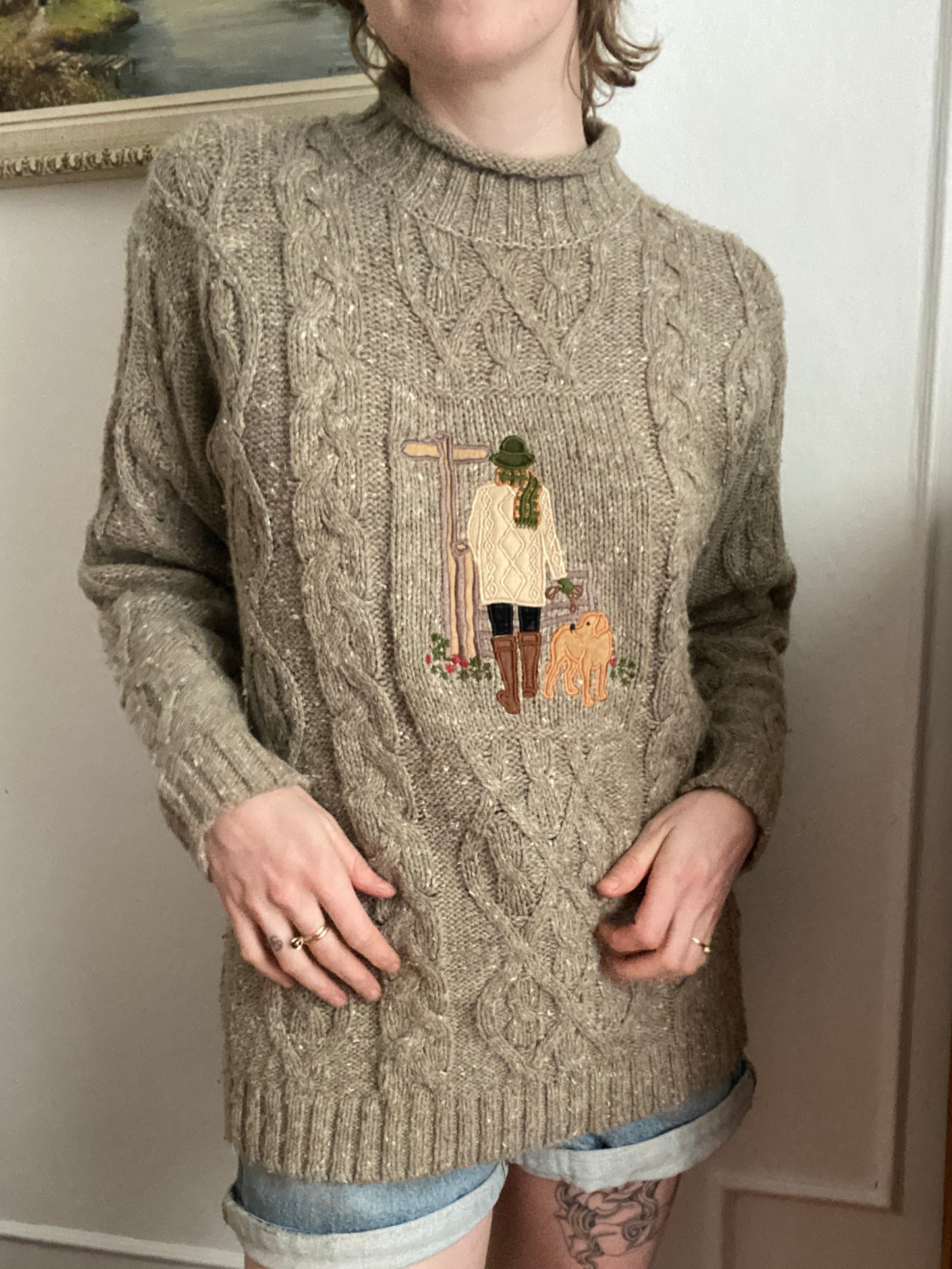 Cable knit mockneck embroidered sweater