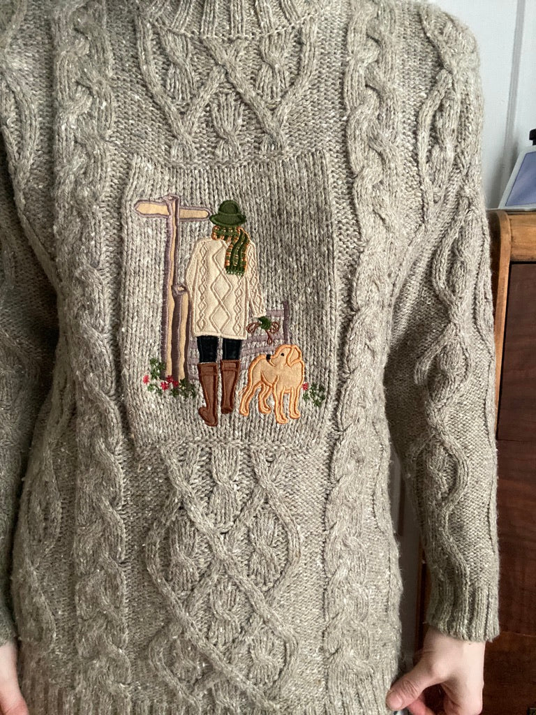 Cable knit mockneck embroidered sweater