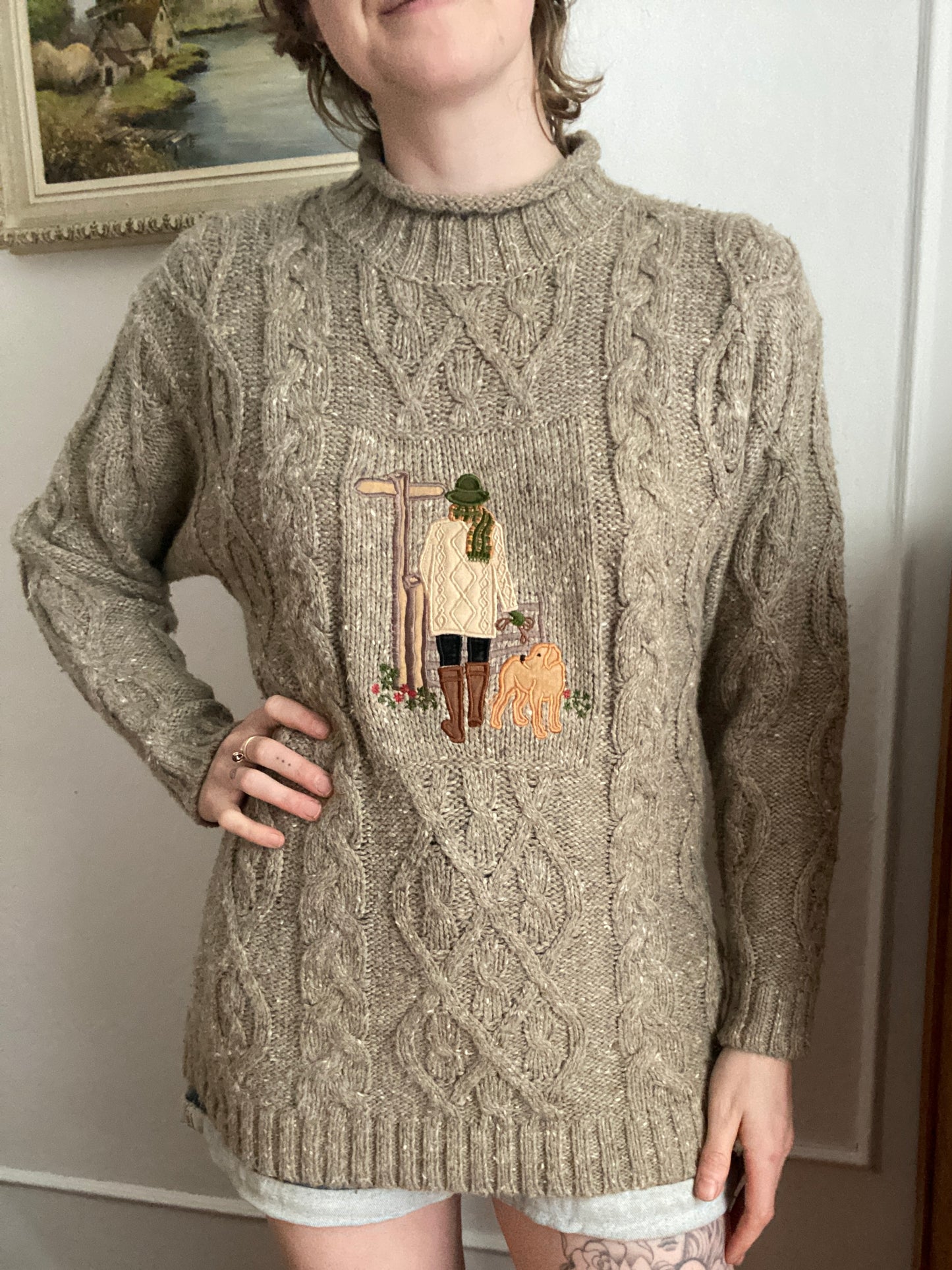 Cable knit mockneck embroidered sweater